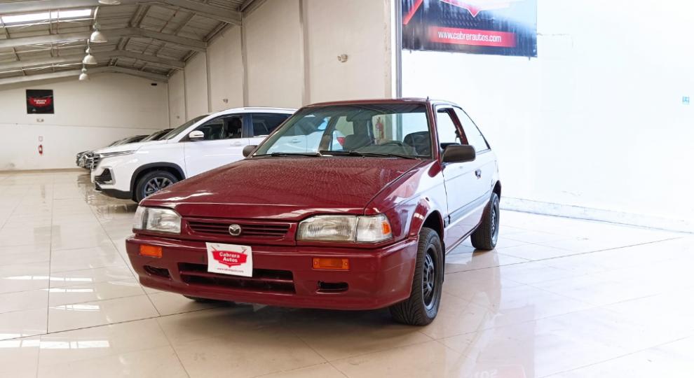Mazda 323 Hei 2002 Quito