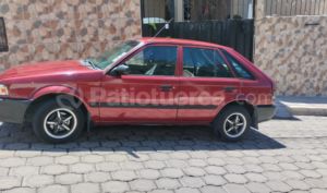 foto de Autos marca Mazda seminuevo modelo 323 HSI año 2003 en Quito