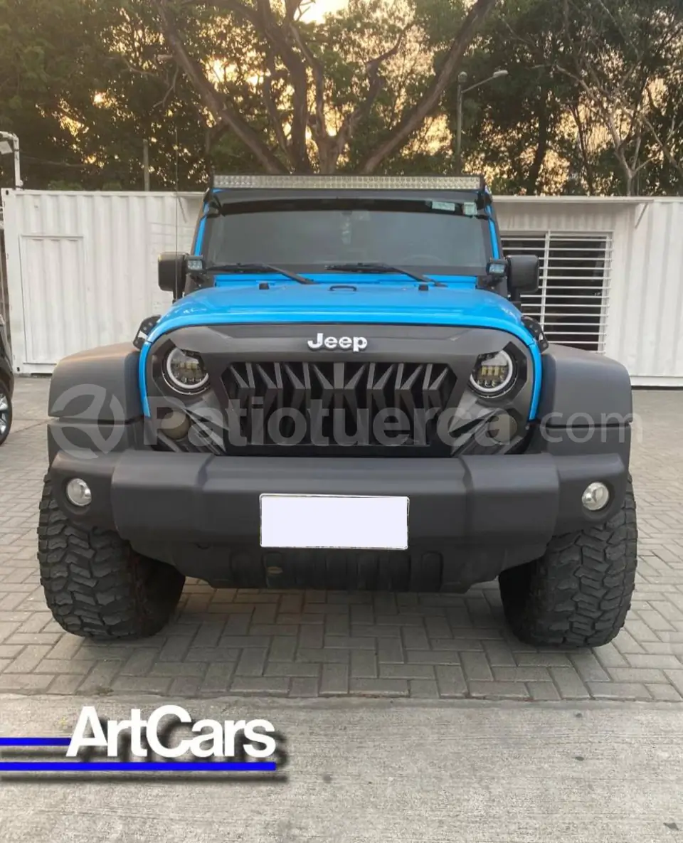 Foto 1 de Jeep Wrangler Unlimited Sport