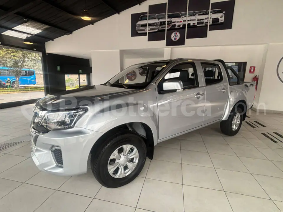 Foto 2 de JIM RE‑MAX 4X2