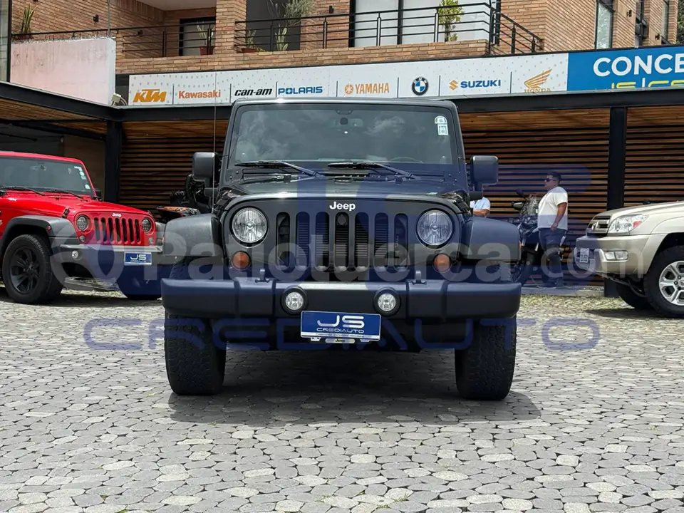 Foto 1 de Jeep Wrangler Unlimited Sport