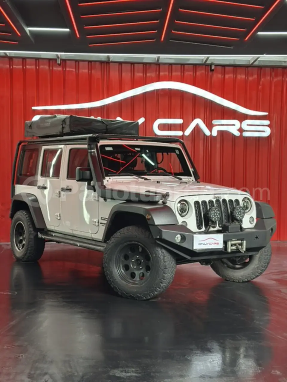 Foto 1 de Jeep Wrangler Unlimited Sport
